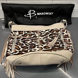 B, Makowsky Cowhide Leather purse with Fringe. Butter soft medium size